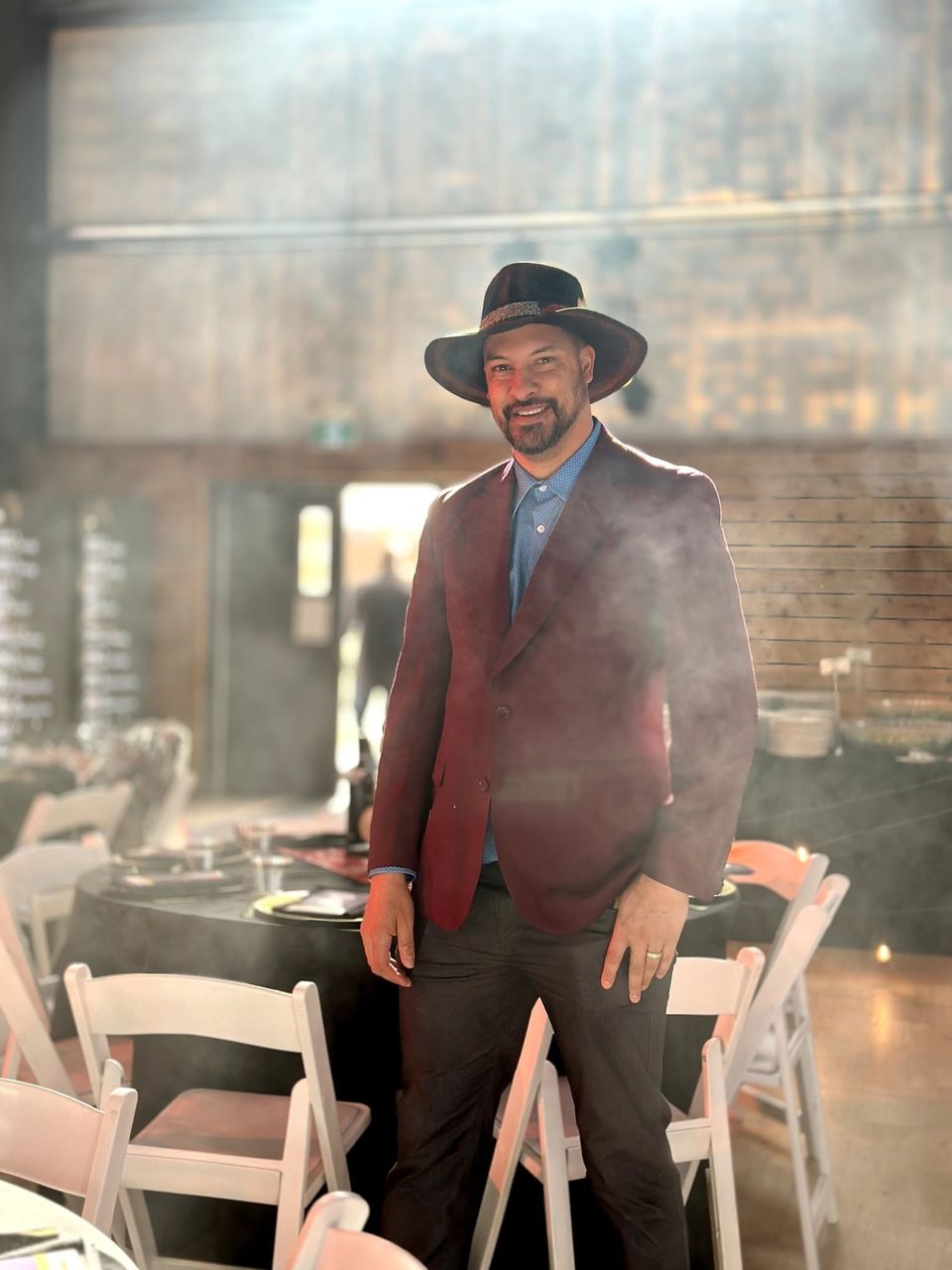 Scott, founder of 1983 Hatters, wearing one of his handmade wide-brim fedoras