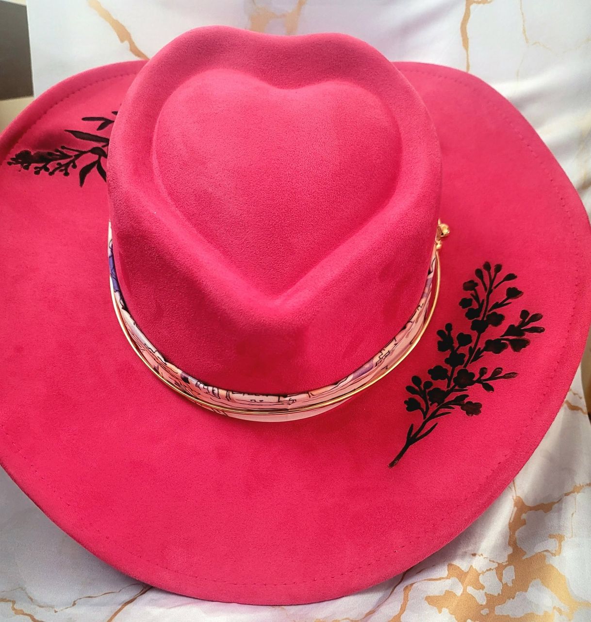 Finished pink suede Sweetheart hat seen from above
